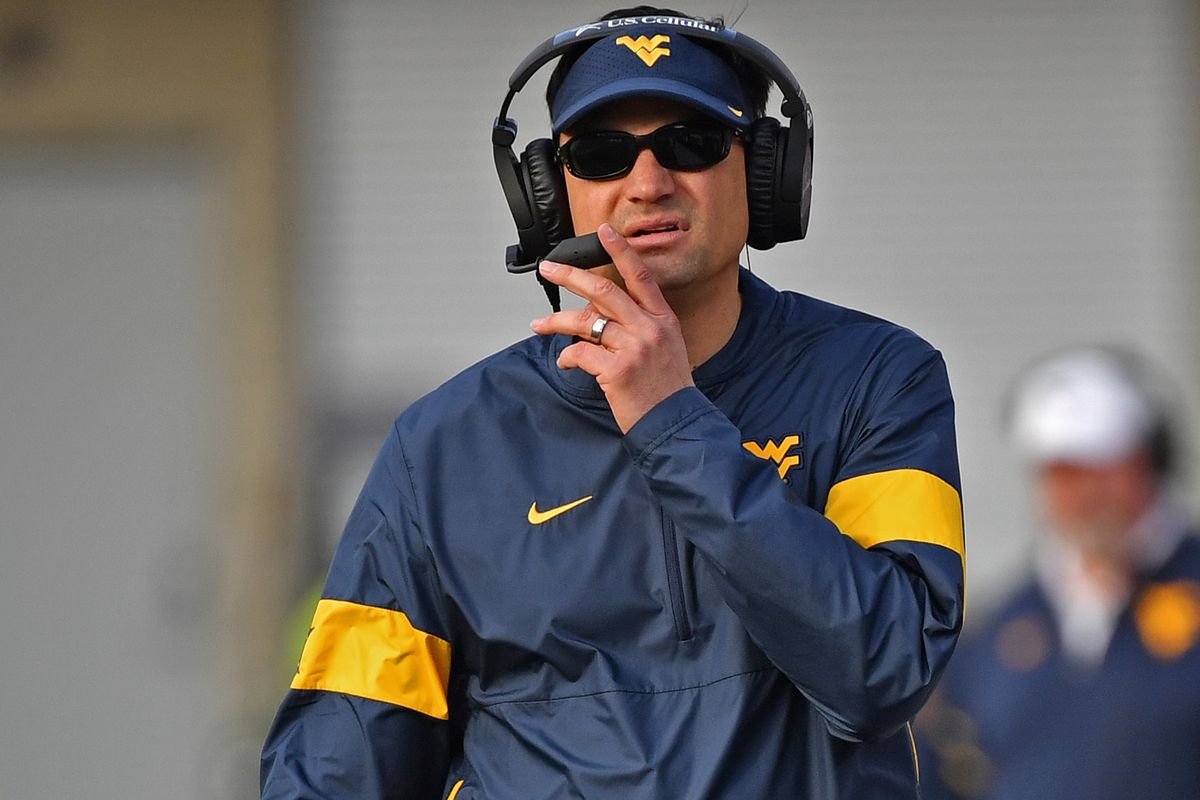 Neal Brown, the head coach of the West Virginia Mountaineers football team, is furious and is leaving the team after being suspended and charged with criminal…