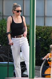 JUST NOW: Amber Heard still walking with crutch one month after injuring hip training for marathon.due to